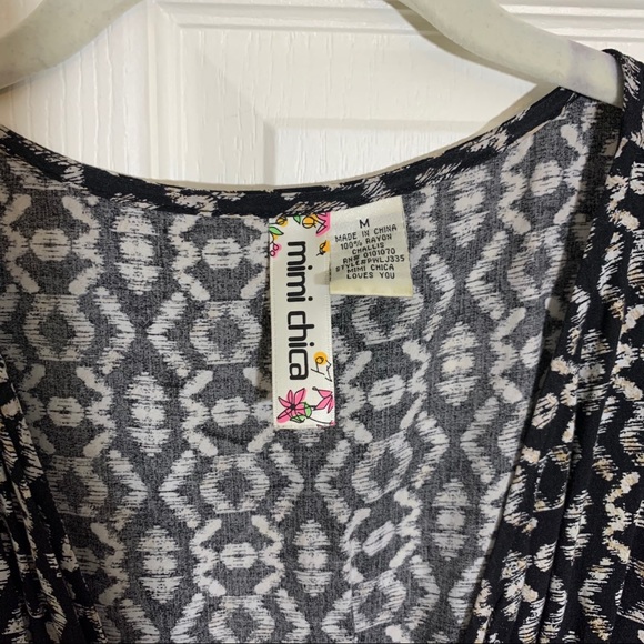 Black Patterned Long Sleeve Romper w/ Front Snap - Picture 7 of 7